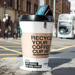 trash bin for disposable coffee cups that looks like one